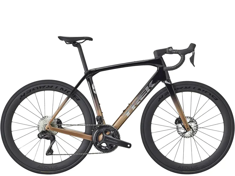 Trek Domane SL 7 Gen 4 Road Bike in Dark Star to Bronze Age Fade